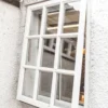 hinged window with a sliding fly screen