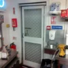 fly screen door in a restaurant kitchen
